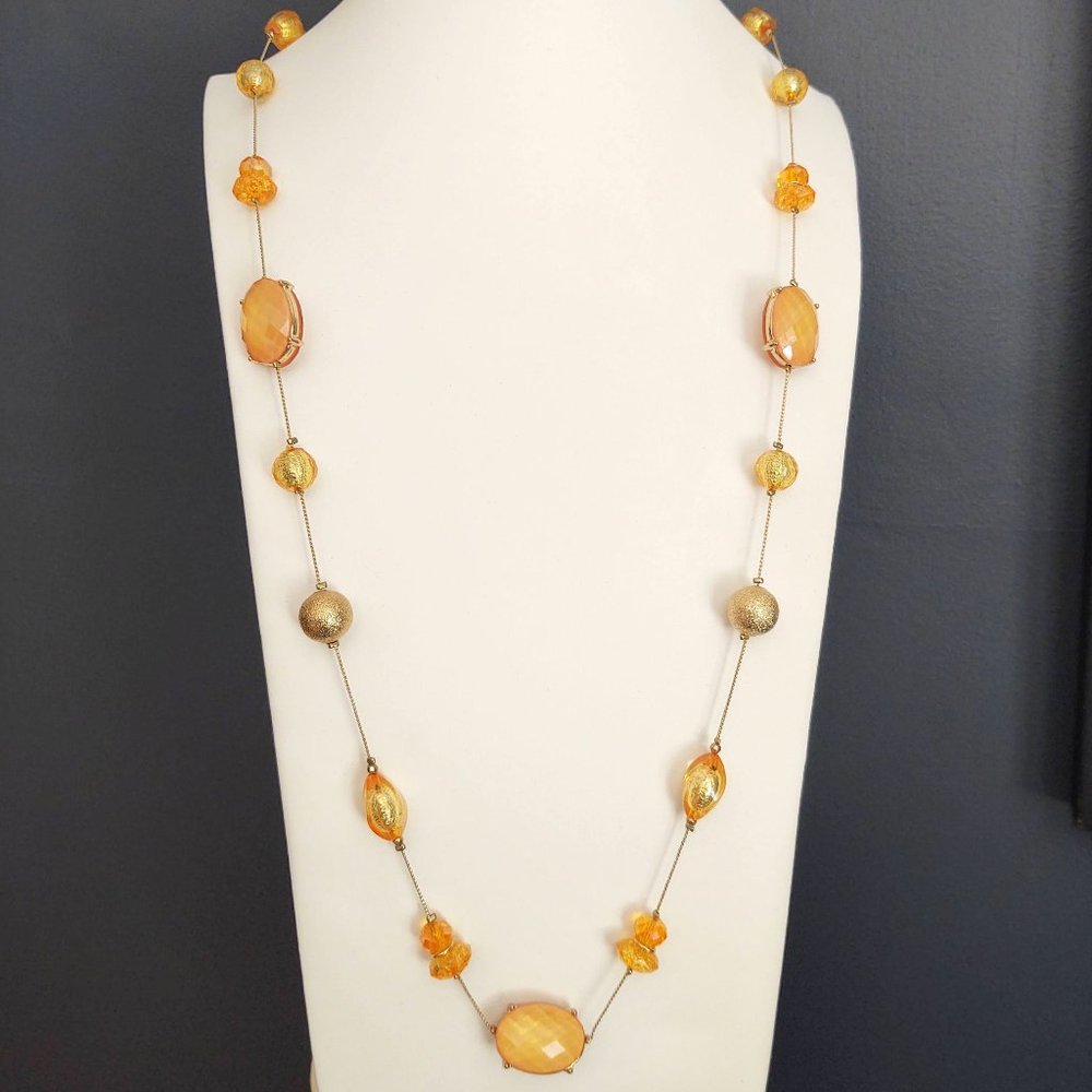 Shades of orange and gold beaded long necklace